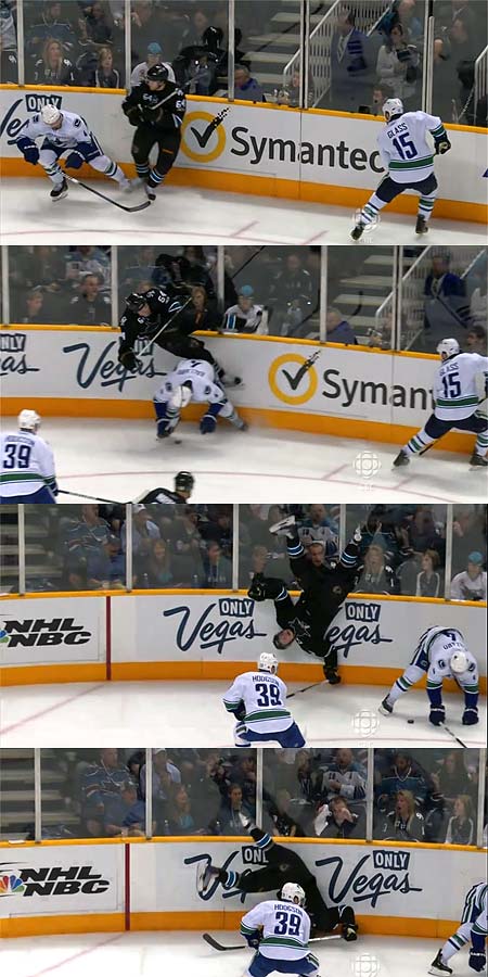 Western Conference Finals defenseman Keith Ballard low hit on Sharks forward Jamie McGinn sends him on an aerial cartwheel