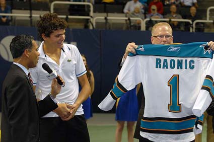 2011 SAP Open champion Milos Raonic handed maple syrup and Sharks jersey