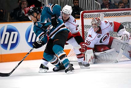 San Jose Sharks center Joe Pavelski backhand spin-o-rama shot on goal